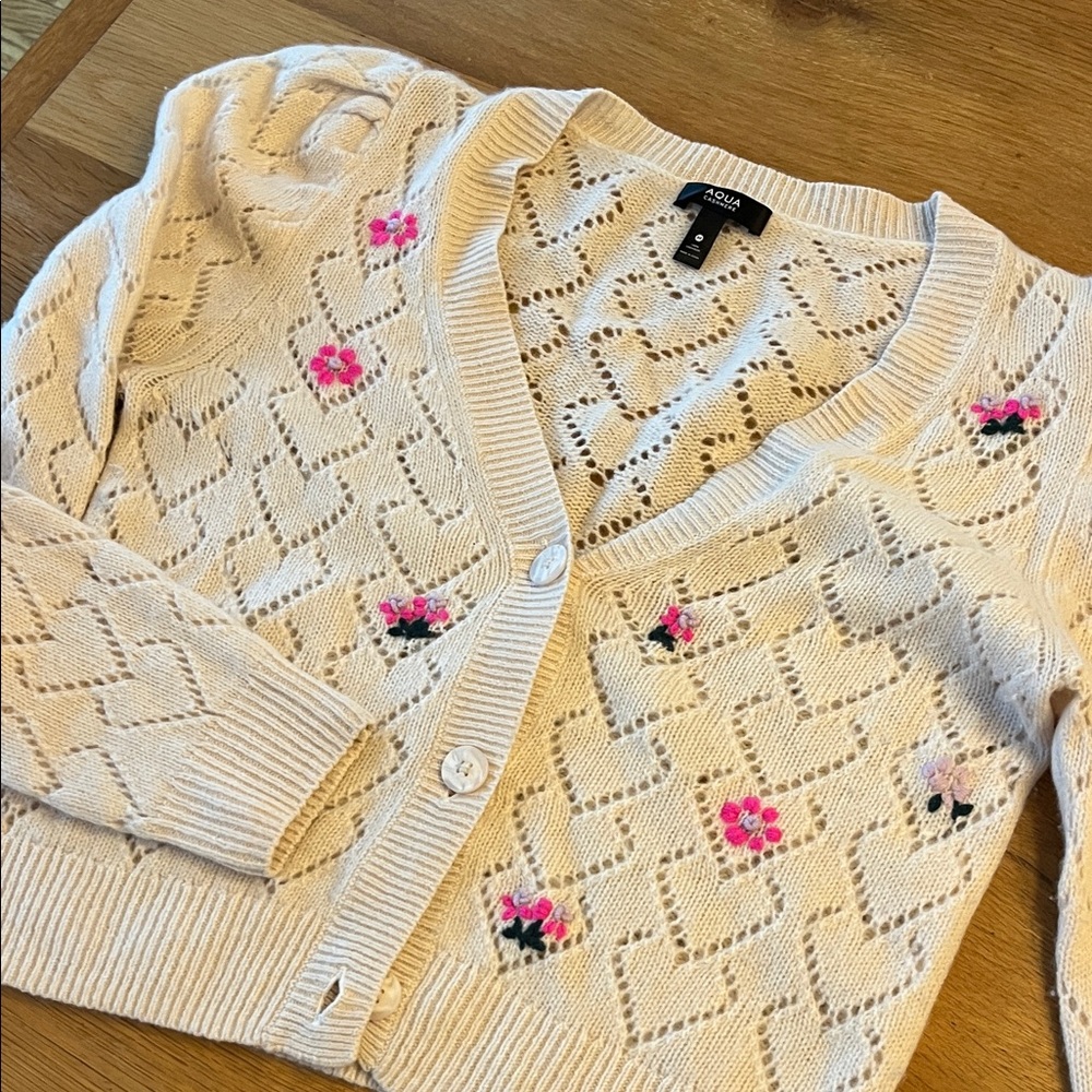 Aqua Cashmere Sweater with embroidered flowers Great condition,Tuft shoulders.